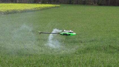 RC Nitro Stunt Helicopter Tricks close over the Ground Lucky