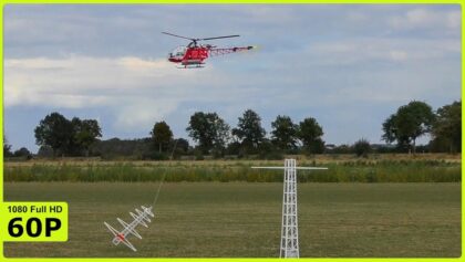 BEAUTIFUL LAMA SA-315B FLIES WITH A POWER POLE ON A