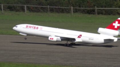 Huge Swiss MD-11 Turbine Modell Airliner escorted by 3x F-5